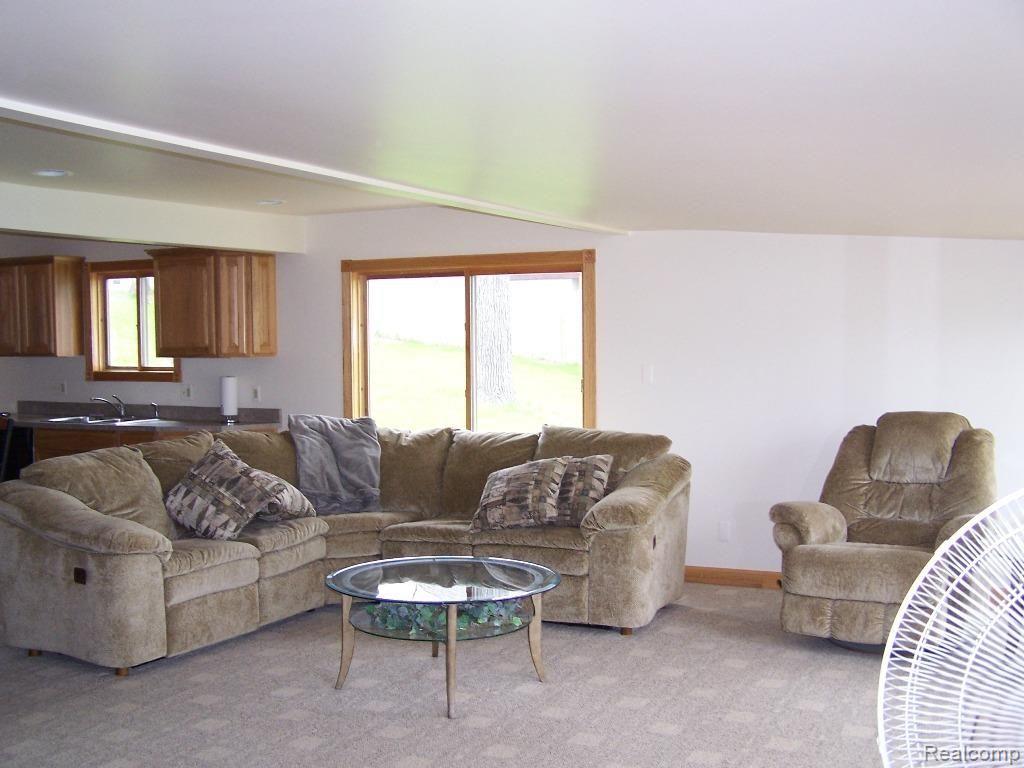 1945 Maxfield Lake Road Hartland, MI 48353 - Photo 7 of 16 Maxfield 1945 Living Room (2).jpg