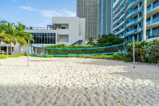 a view of houses with a street