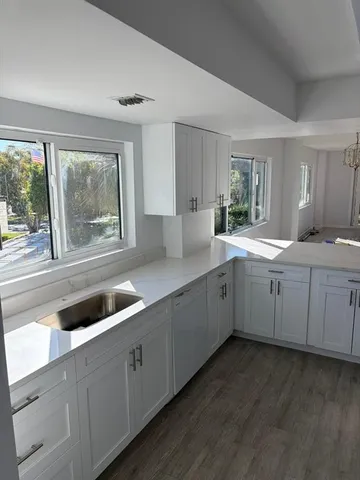 a house view with a garden space