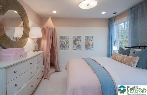 a bed room with a bed and a dresser