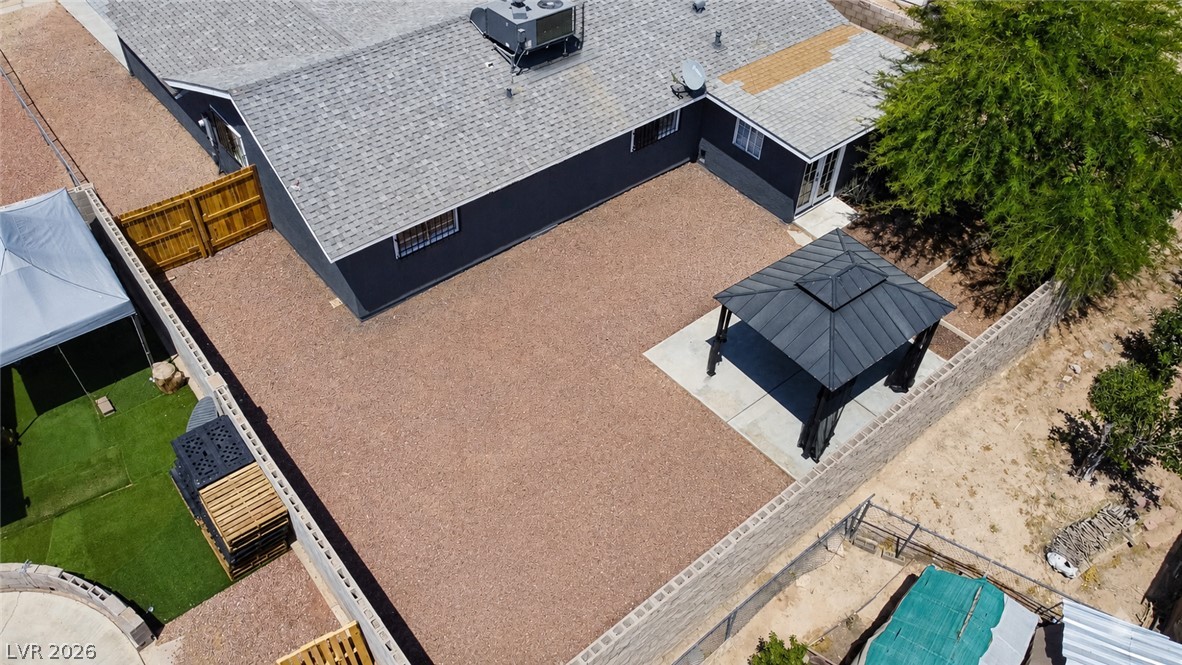 2870 South Sandhill Road Las Vegas, NV 89121 - Photo 64 of 64 A spacious backyard with a charming gazebo offers an ideal setting for outdoor gatherings.