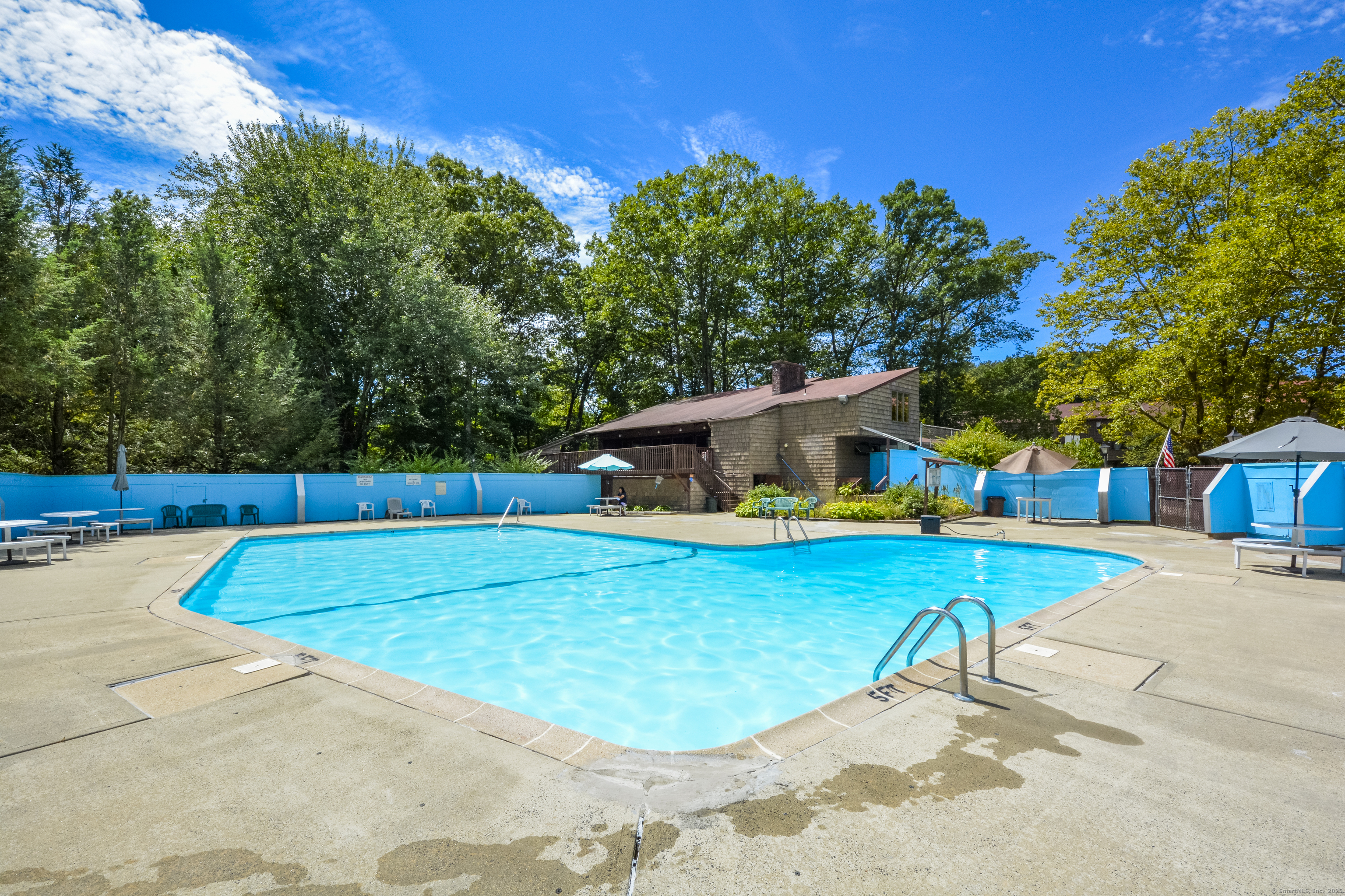 32 Towne House Road, Unit 32 Hamden, CT 06514 - Photo 25 of 35 a view of a swimming pool with a patio and a yard