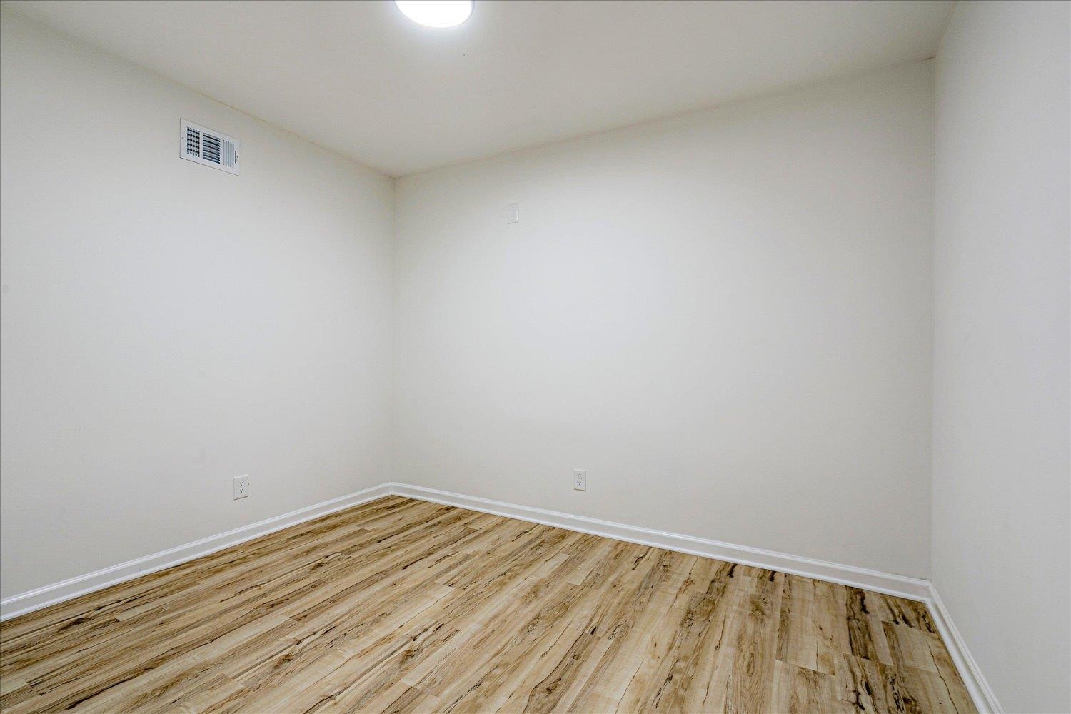 4016 Leech Road Memphis, TN 38109 - Photo 18 of 21 Empty room featuring light wood-style floors and baseboards