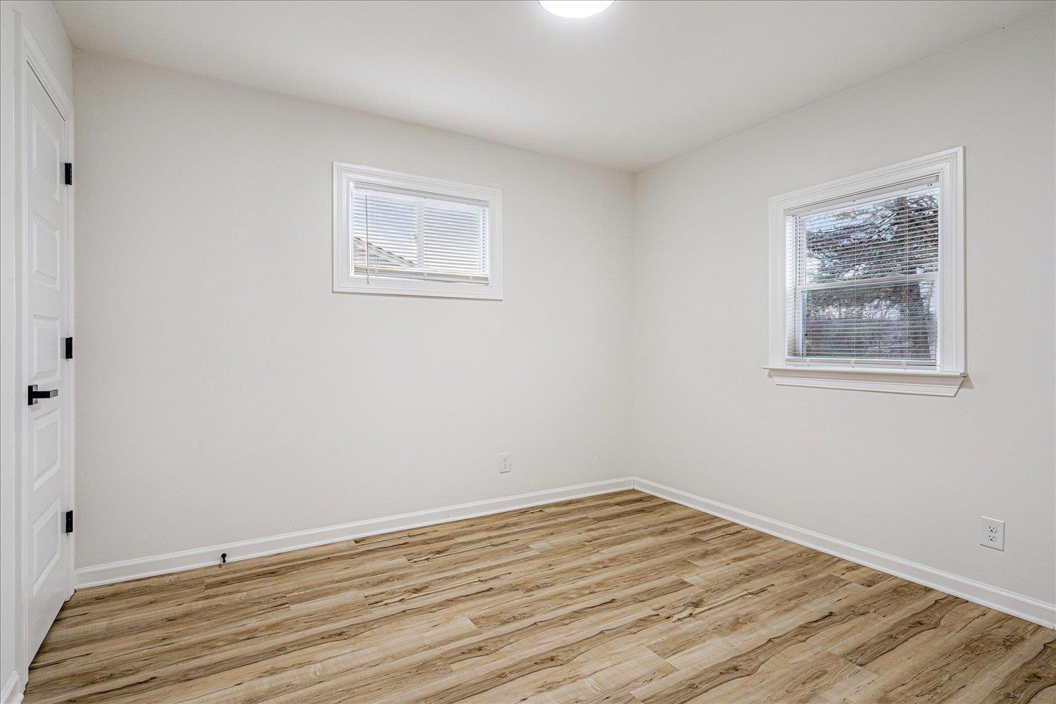 4016 Leech Road Memphis, TN 38109 - Photo 20 of 21 Empty room with light wood-type flooring and baseboards
