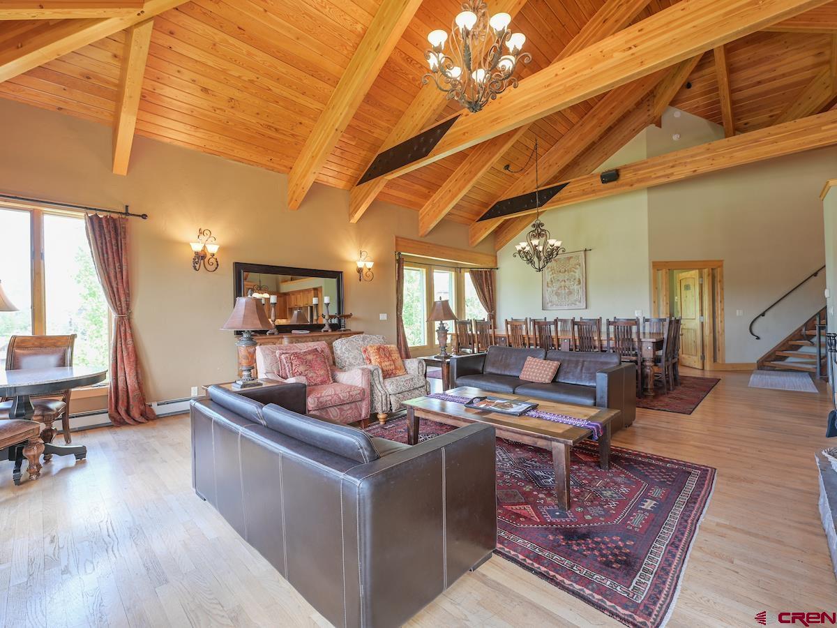 39 Whetstone Road Crested Butte, CO 81225 - Photo 15 of 35 a living room with lots of furniture and a rug