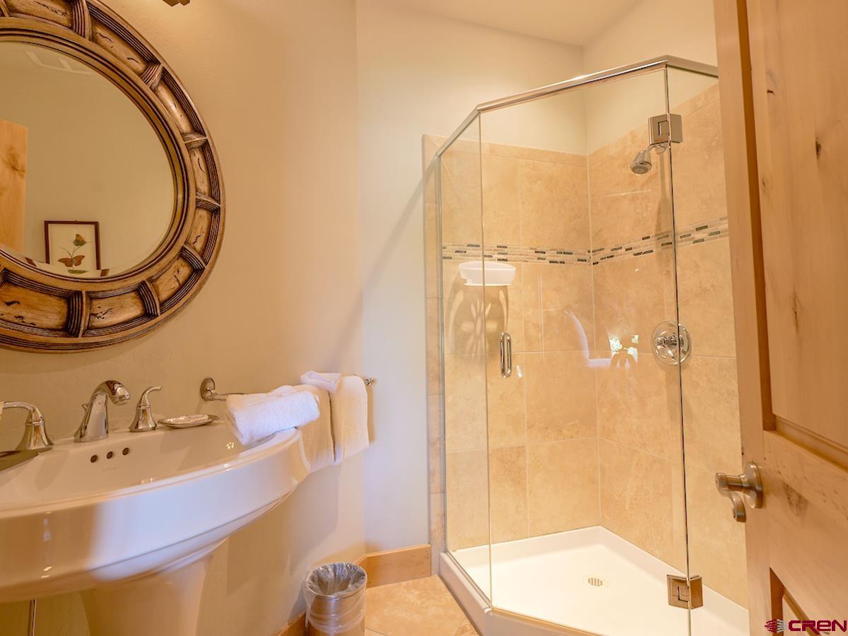 39 Whetstone Road Crested Butte, CO 81225 - Photo 19 of 35 a bathroom with a sink and a mirror