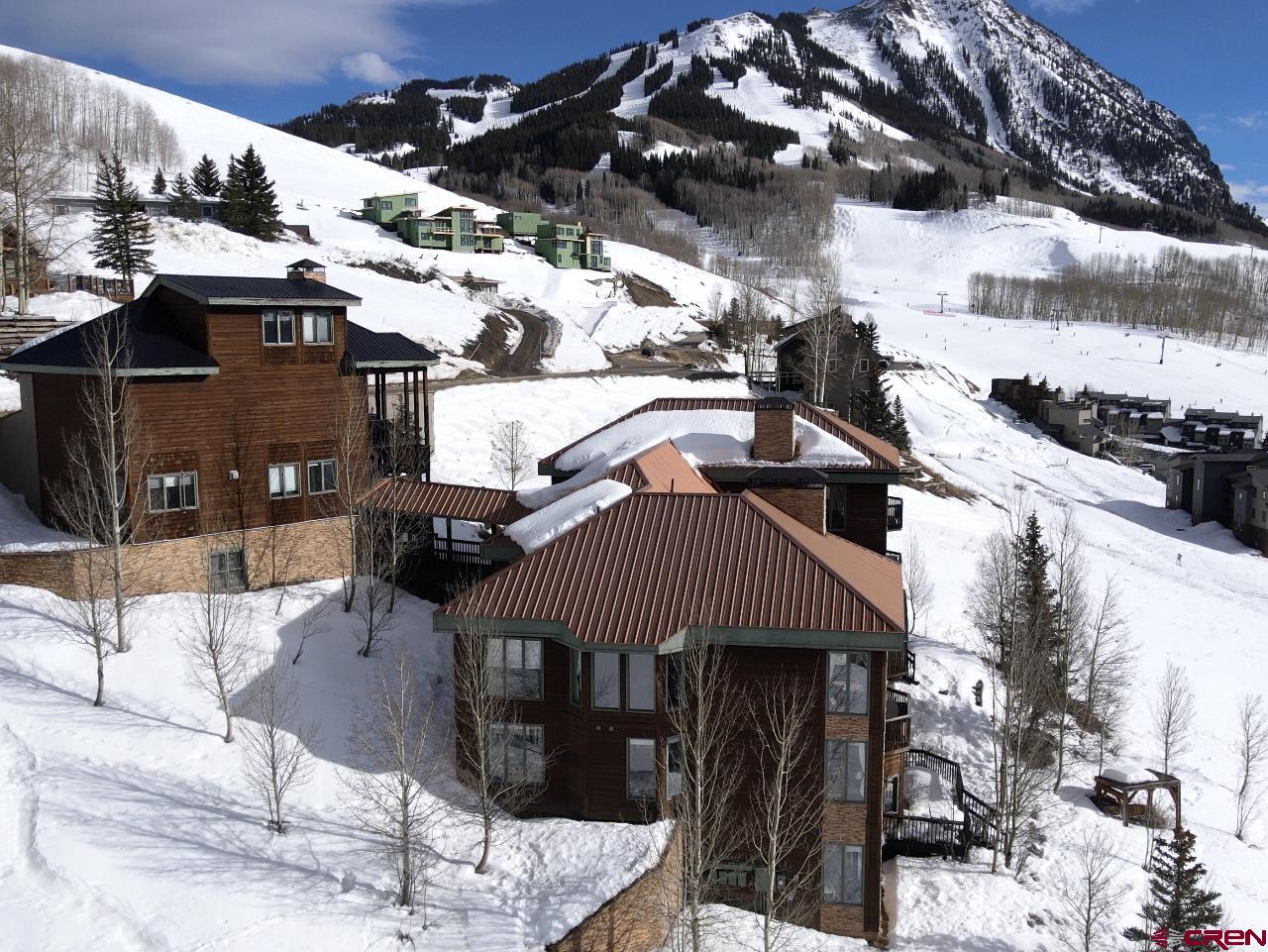39 Whetstone Road Crested Butte, CO 81225 - Photo 2 of 35 a front view of a house with parking area