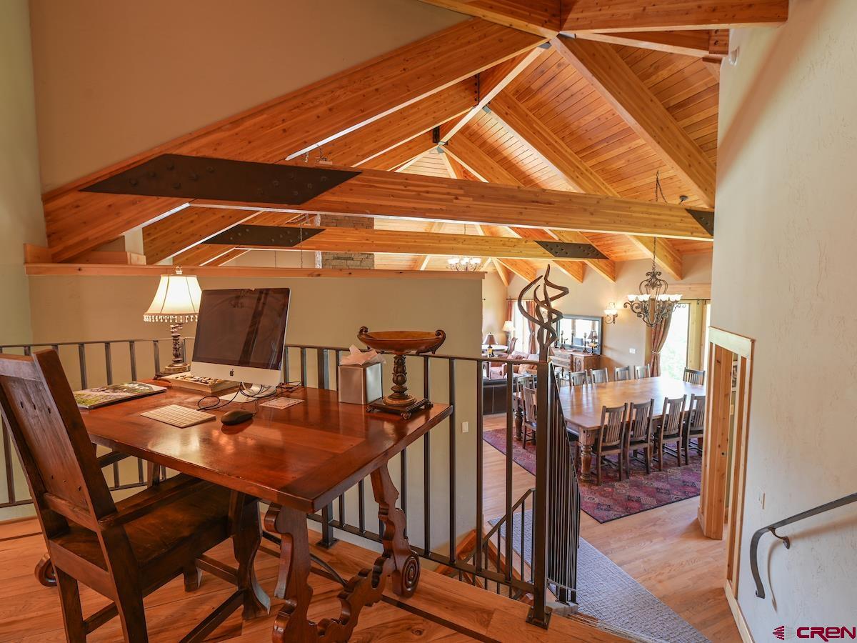 39 Whetstone Road Crested Butte, CO 81225 - Photo 10 of 35 a dining room with furniture and wooden floor