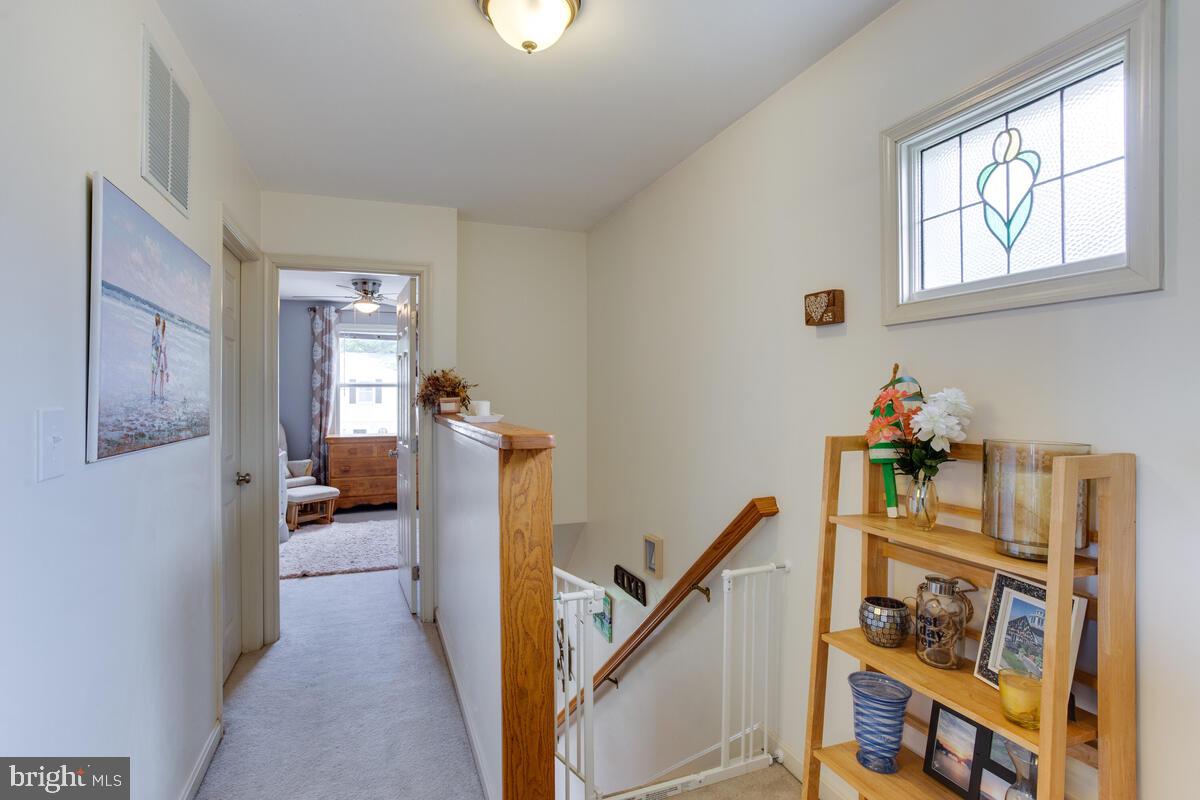 1508 Bishop Road Edgewater, MD 21037 - Photo 22 of 55 Upper Level Landing with Stained Glass Window