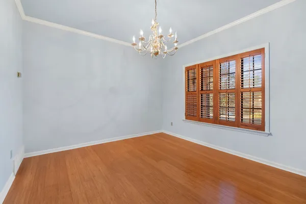 a view of an empty room with a balcony
