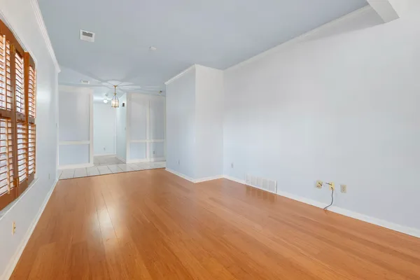 a view of a hall with an entrance