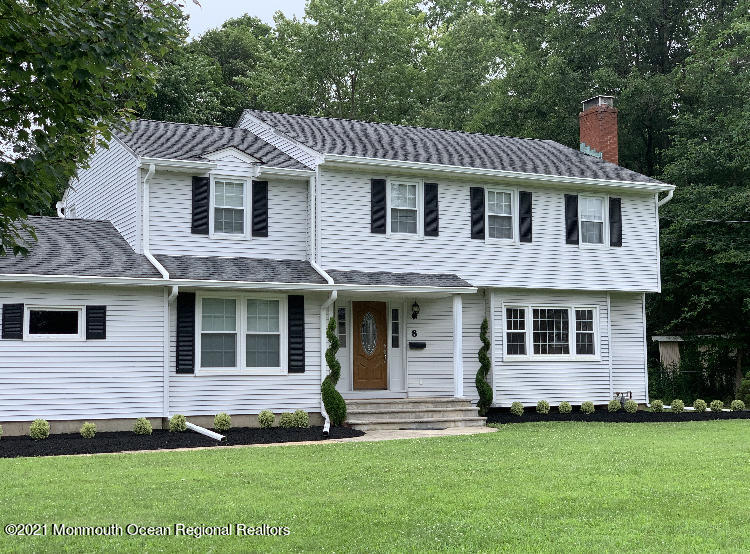 8 Tudor Road Freehold, NJ 07728 - Photo 1 of 46 a front view of a house with a garden