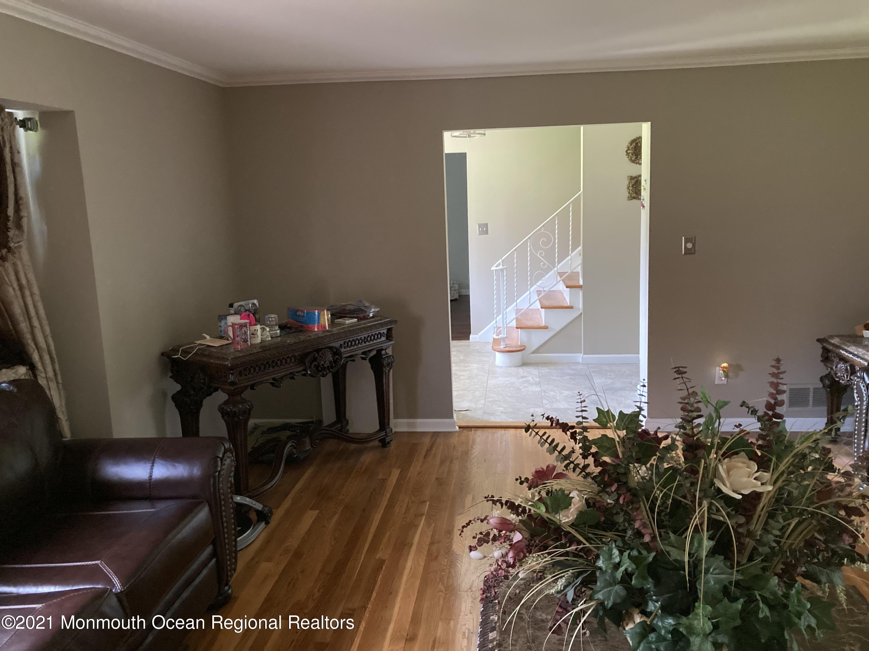 8 Tudor Road Freehold, NJ 07728 - Photo 14 of 46 a living room with furniture