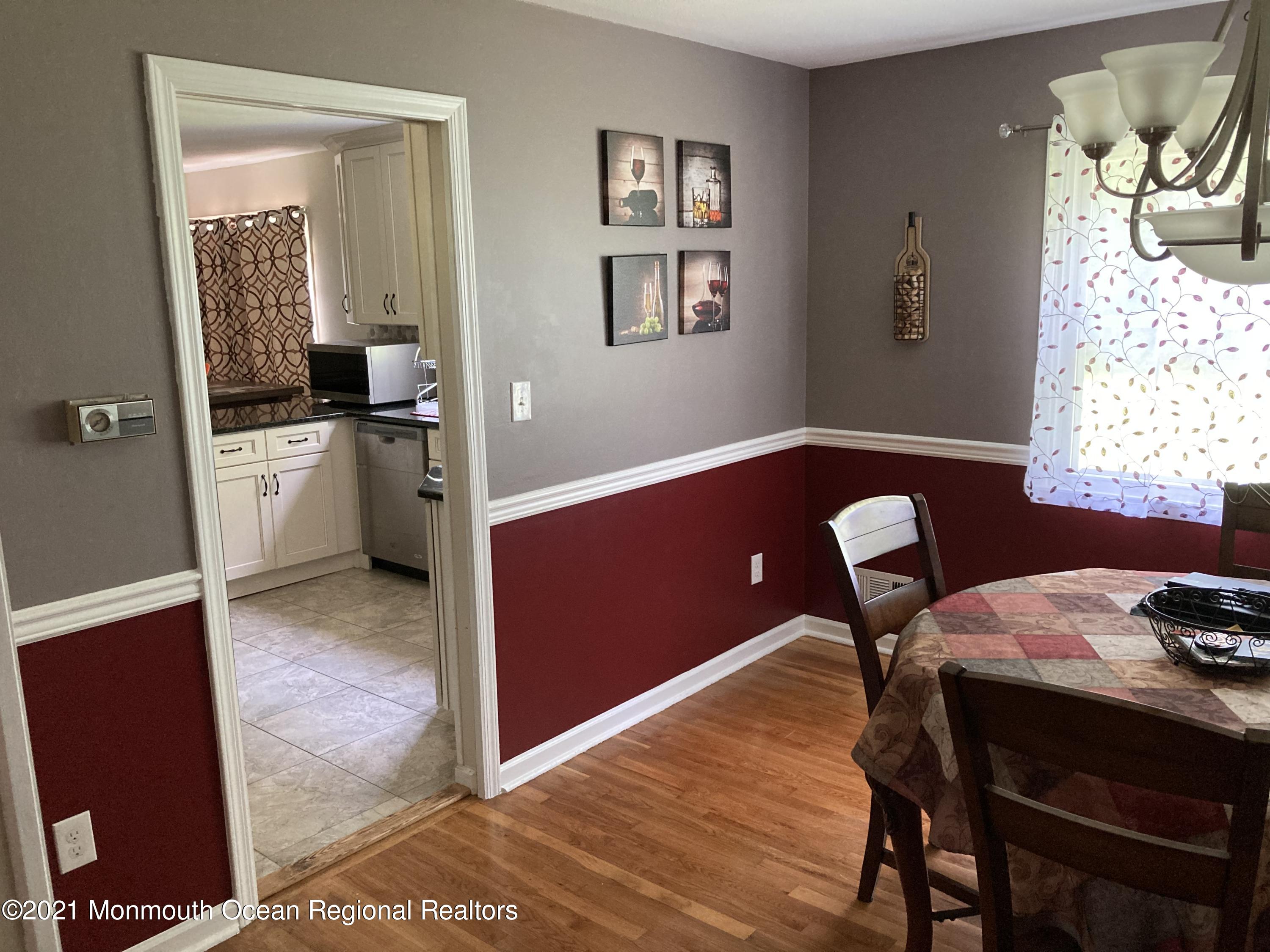 8 Tudor Road Freehold, NJ 07728 - Photo 19 of 46 a workspace with furniture and window