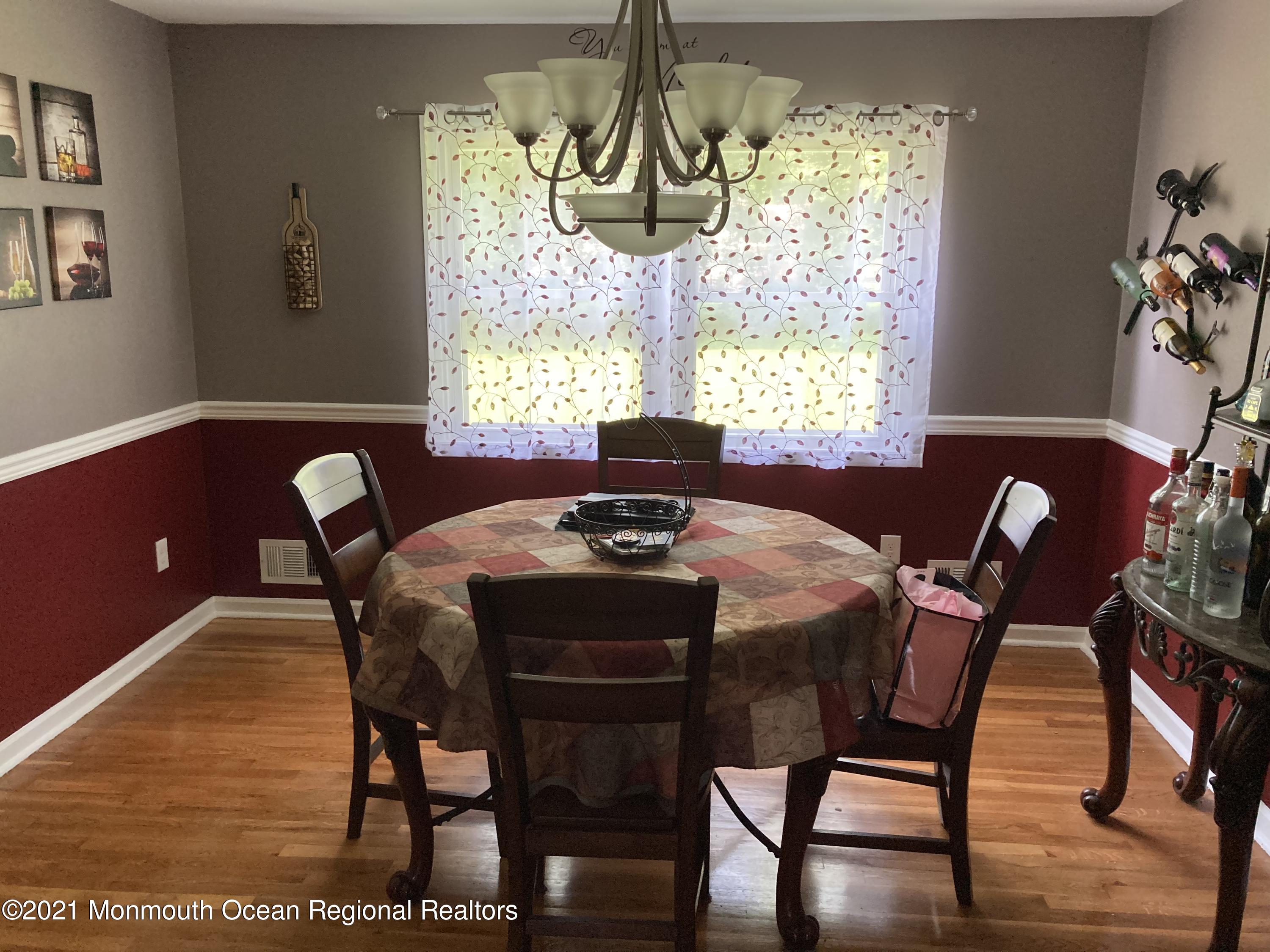 8 Tudor Road Freehold, NJ 07728 - Photo 21 of 46 a dining room with furniture and window