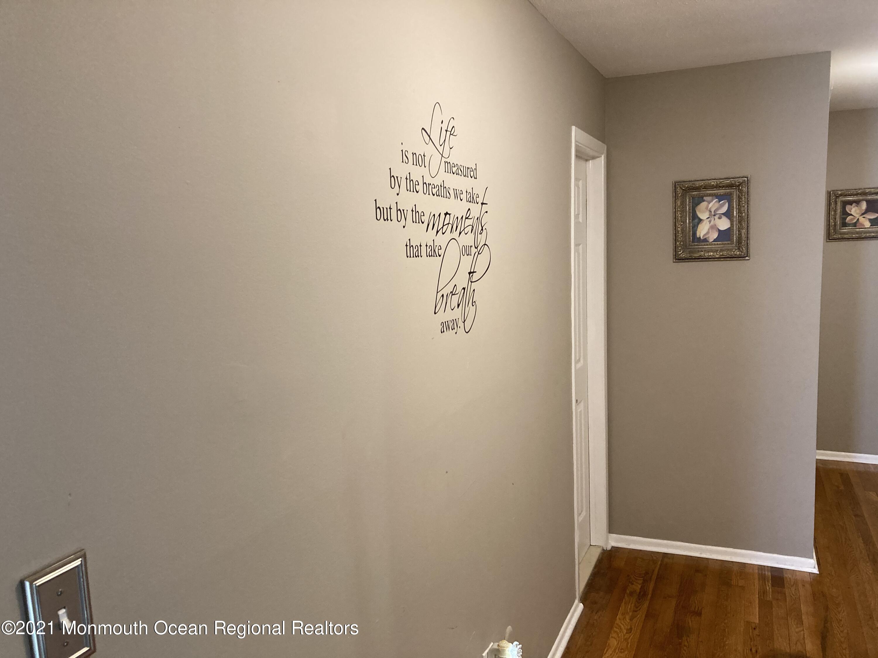 8 Tudor Road Freehold, NJ 07728 - Photo 23 of 46 a view of a hallway with closet