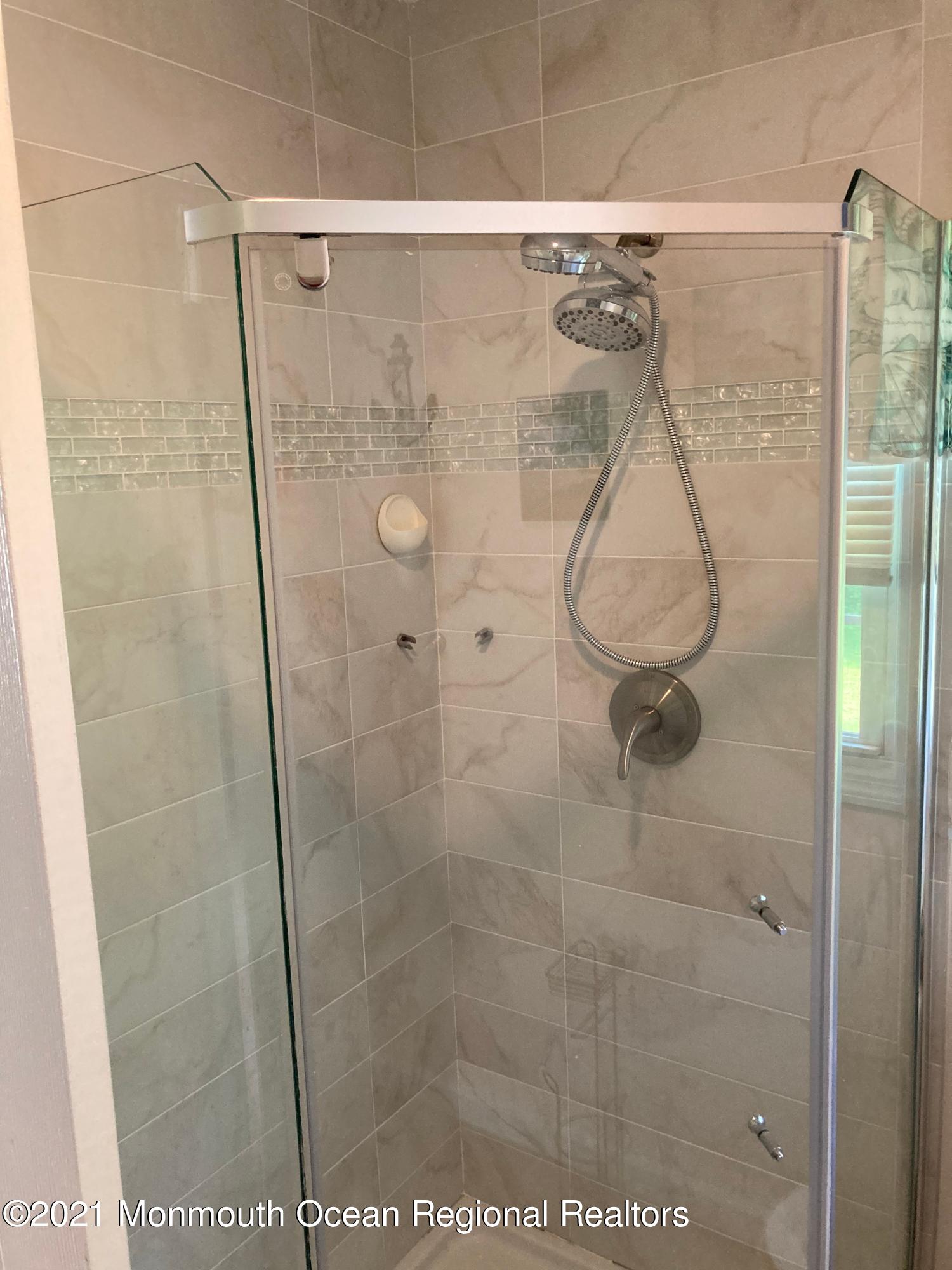 8 Tudor Road Freehold, NJ 07728 - Photo 27 of 46 a bathroom with a shower