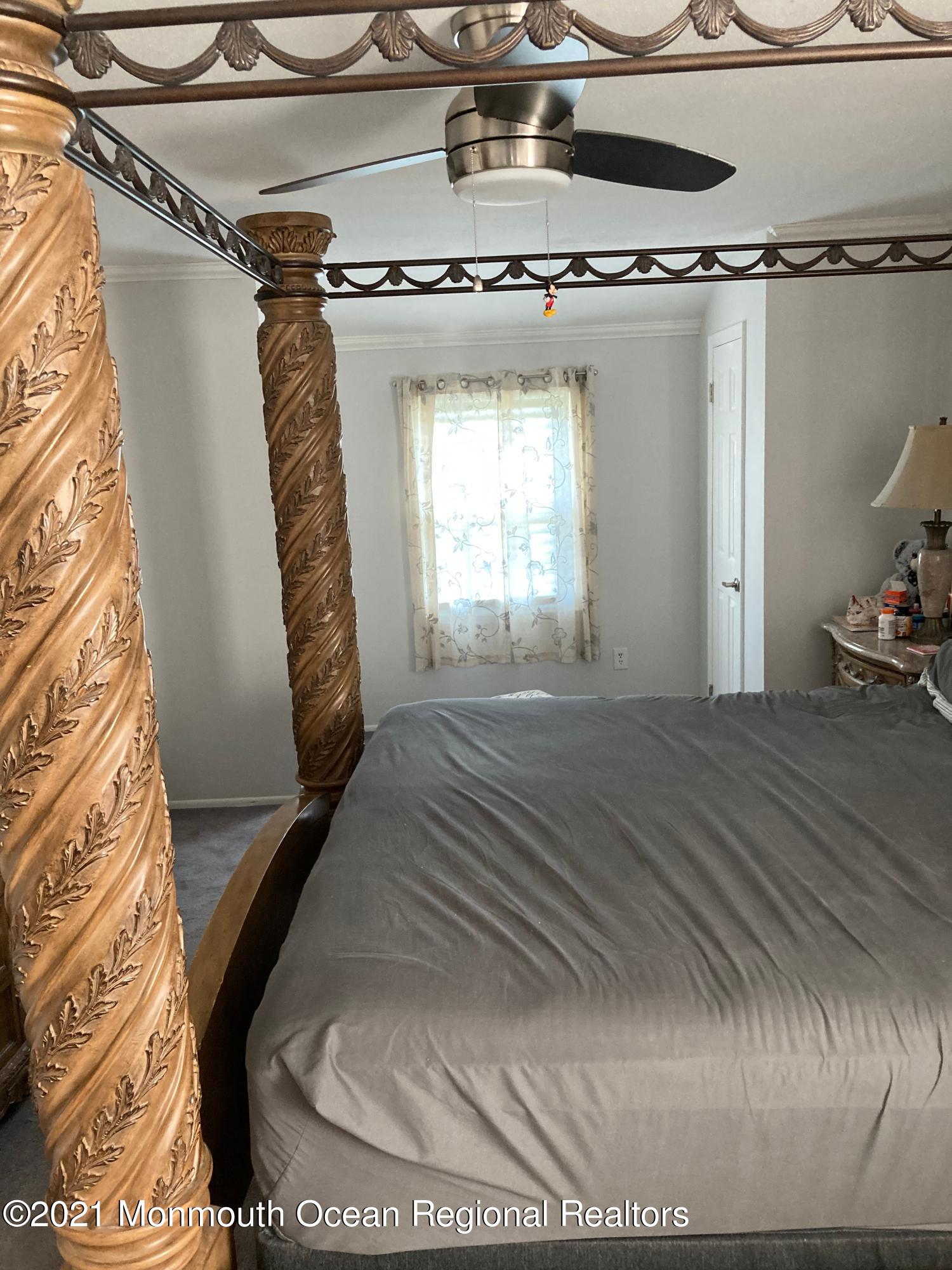 8 Tudor Road Freehold, NJ 07728 - Photo 32 of 46 a bedroom with a bed and a window