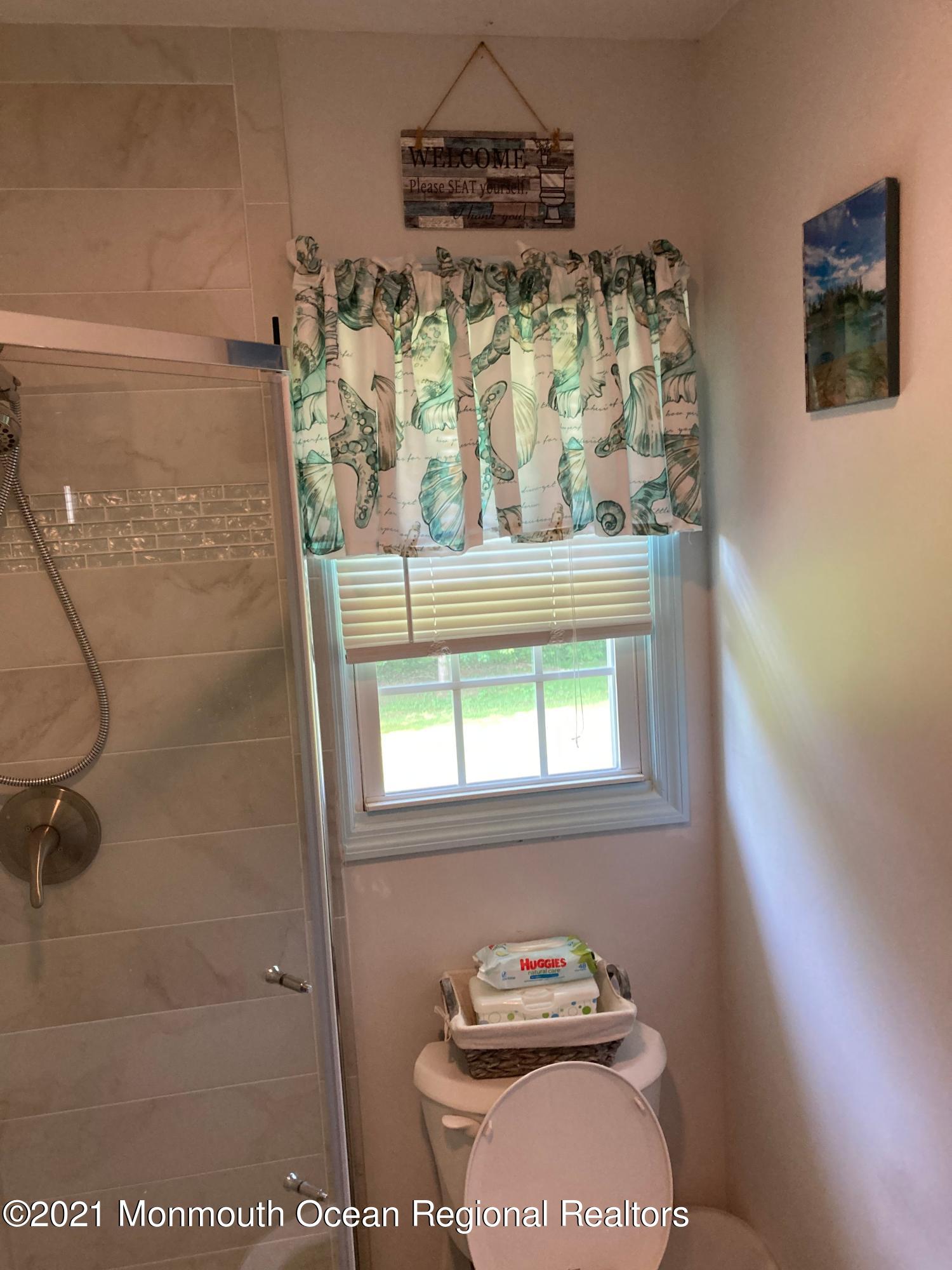 8 Tudor Road Freehold, NJ 07728 - Photo 33 of 46 a bathroom with a window