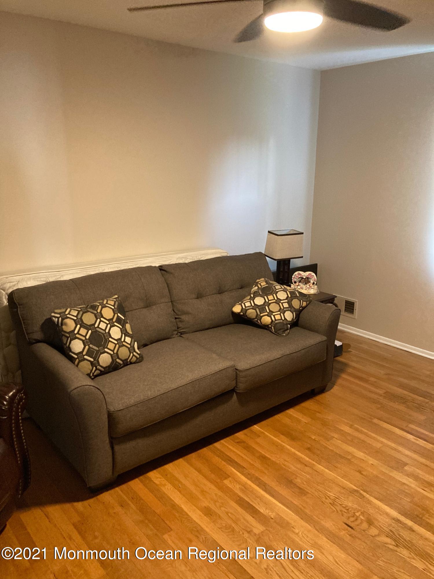8 Tudor Road Freehold, NJ 07728 - Photo 40 of 46 a living room with furniture
