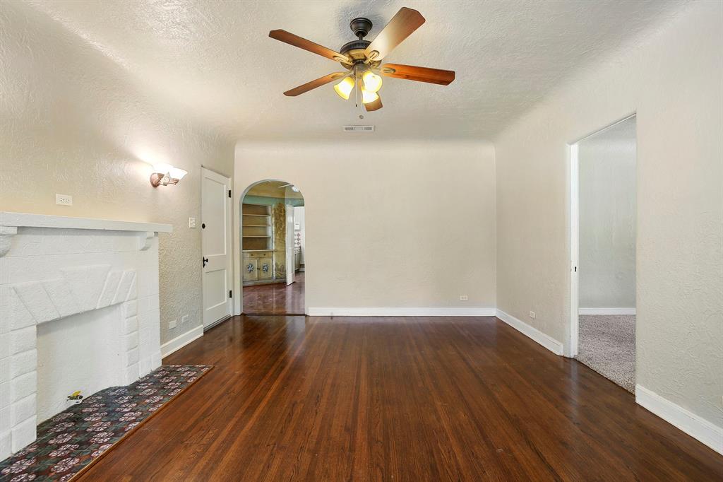 6025 Lewis Street Dallas, TX 75206 - Photo 12 of 37 wooden floor in an empty room with a window