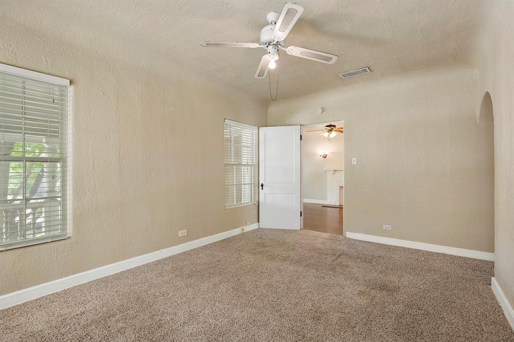6025 Lewis Street Dallas, TX 75206 - Photo 15 of 37 an empty room with windows and fan