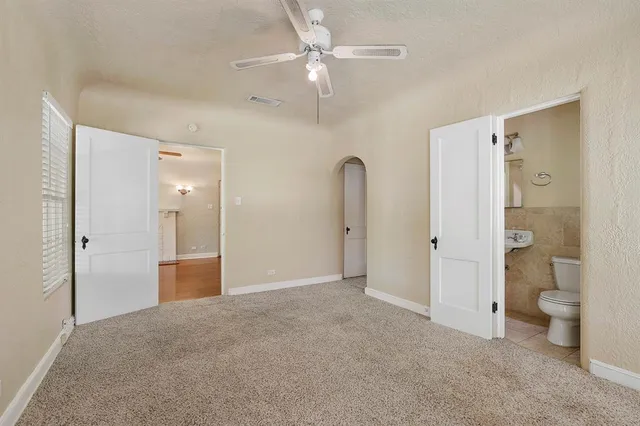 a bathroom with a sink a mirror and shower