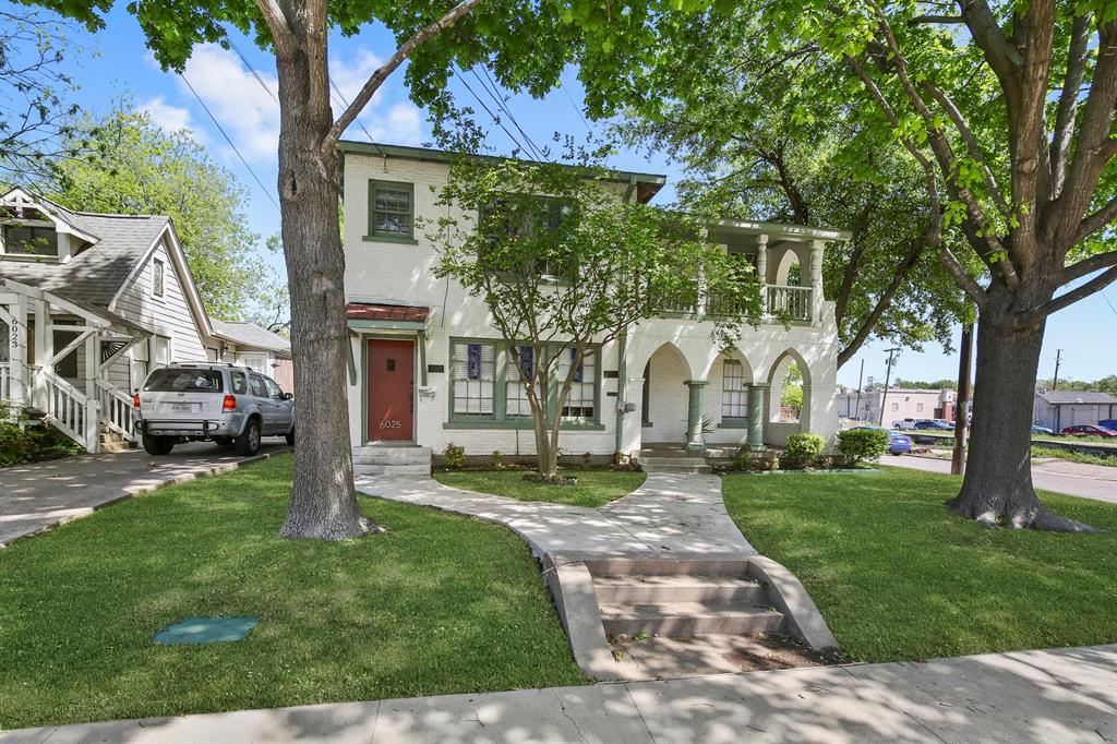 6025 Lewis Street Dallas, TX 75206 - Photo 2 of 37 a front view of a house with garden