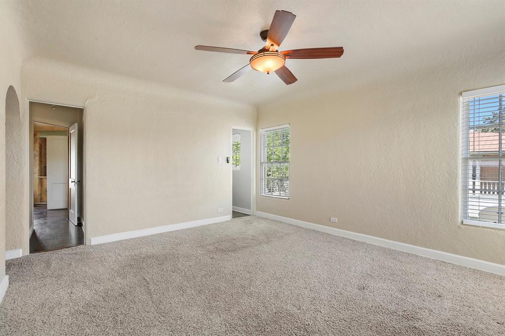 6025 Lewis Street Dallas, TX 75206 - Photo 27 of 37 an empty room with windows and fan