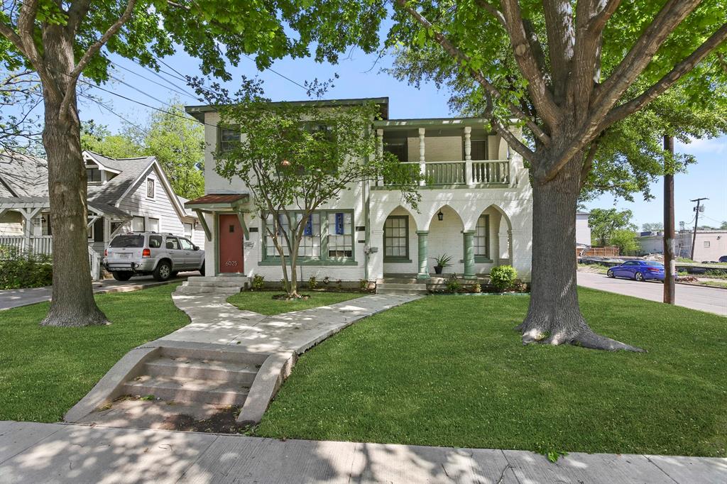 6025 Lewis Street Dallas, TX 75206 - Photo 3 of 37 a view of a white house with a yard