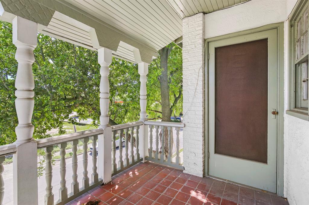 6025 Lewis Street Dallas, TX 75206 - Photo 33 of 37 a view of a porch with wooden floor and outdoor space