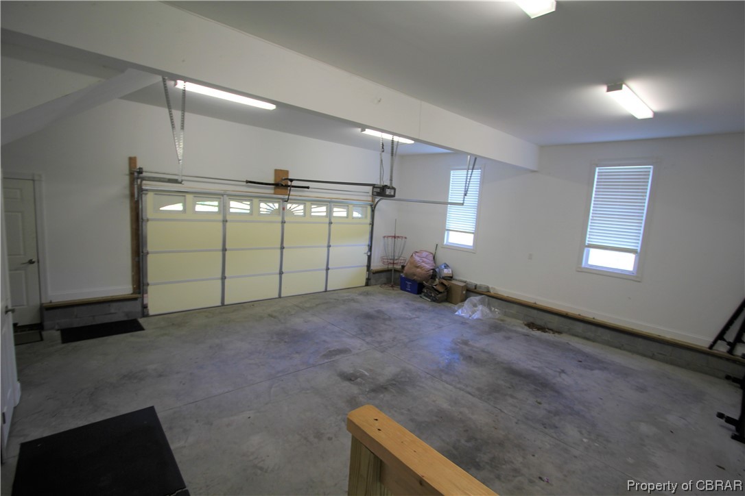1018 Bland Point Road Deltaville, VA 23043 - Photo 36 of 48 Large garage with mechanical room