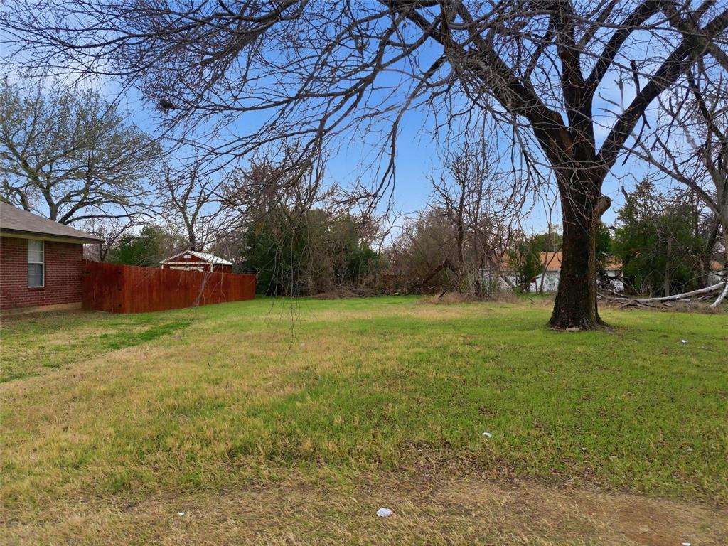 1220 Preston Street Waco, TX 76704 - Photo 4 of 12 a fire hydrant in the middle of a field
