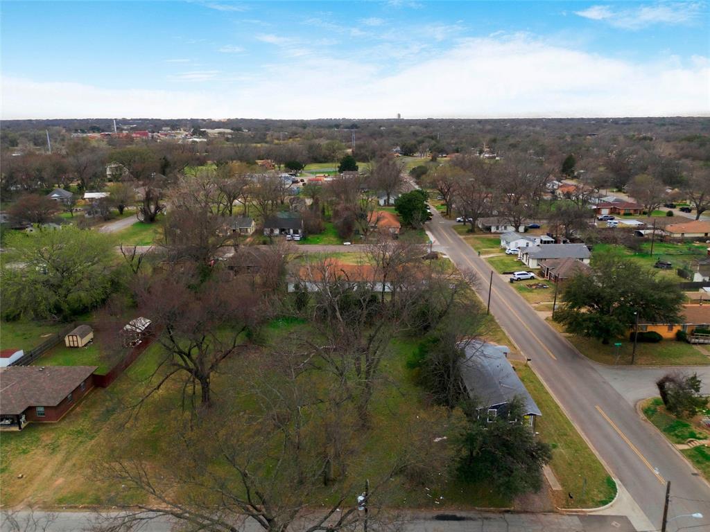 1220 Preston Street Waco, TX 76704 - Photo 8 of 12 an aerial view of residential houses with outdoor space and river