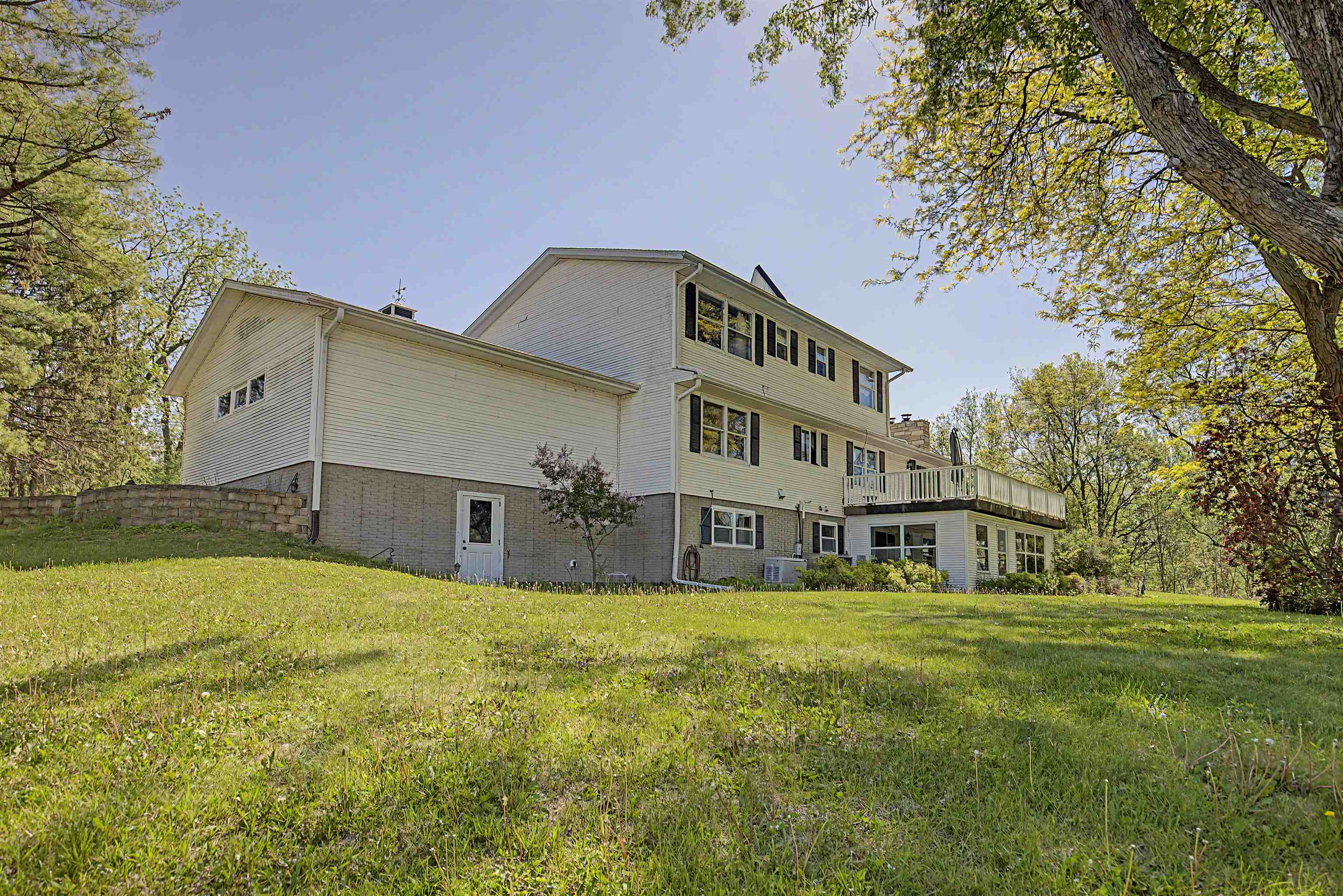 17380 Corbett Road Mount Carroll, IL 61053 - Photo 56 of 65 a view of a house with a yard