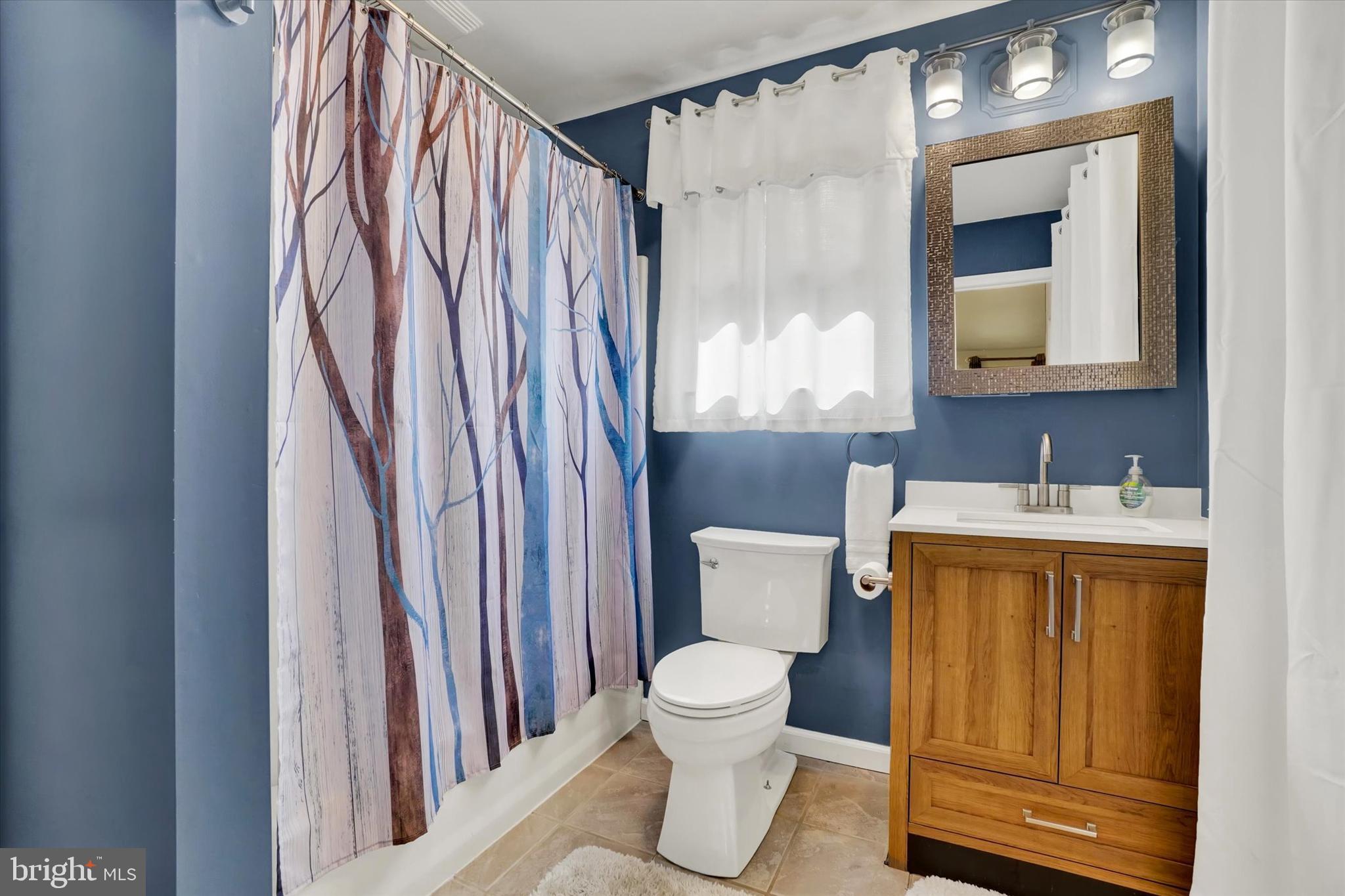82 Fox Creek Road Wrightsville, PA 17368 - Photo 11 of 32 a bathroom with a toilet sink and mirror