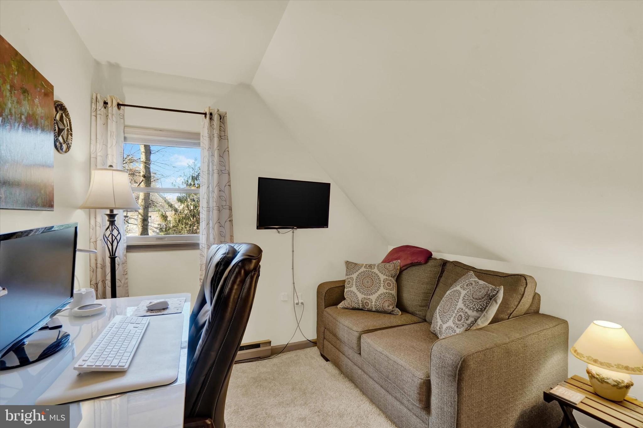82 Fox Creek Road Wrightsville, PA 17368 - Photo 15 of 32 a living room with furniture and a flat screen tv