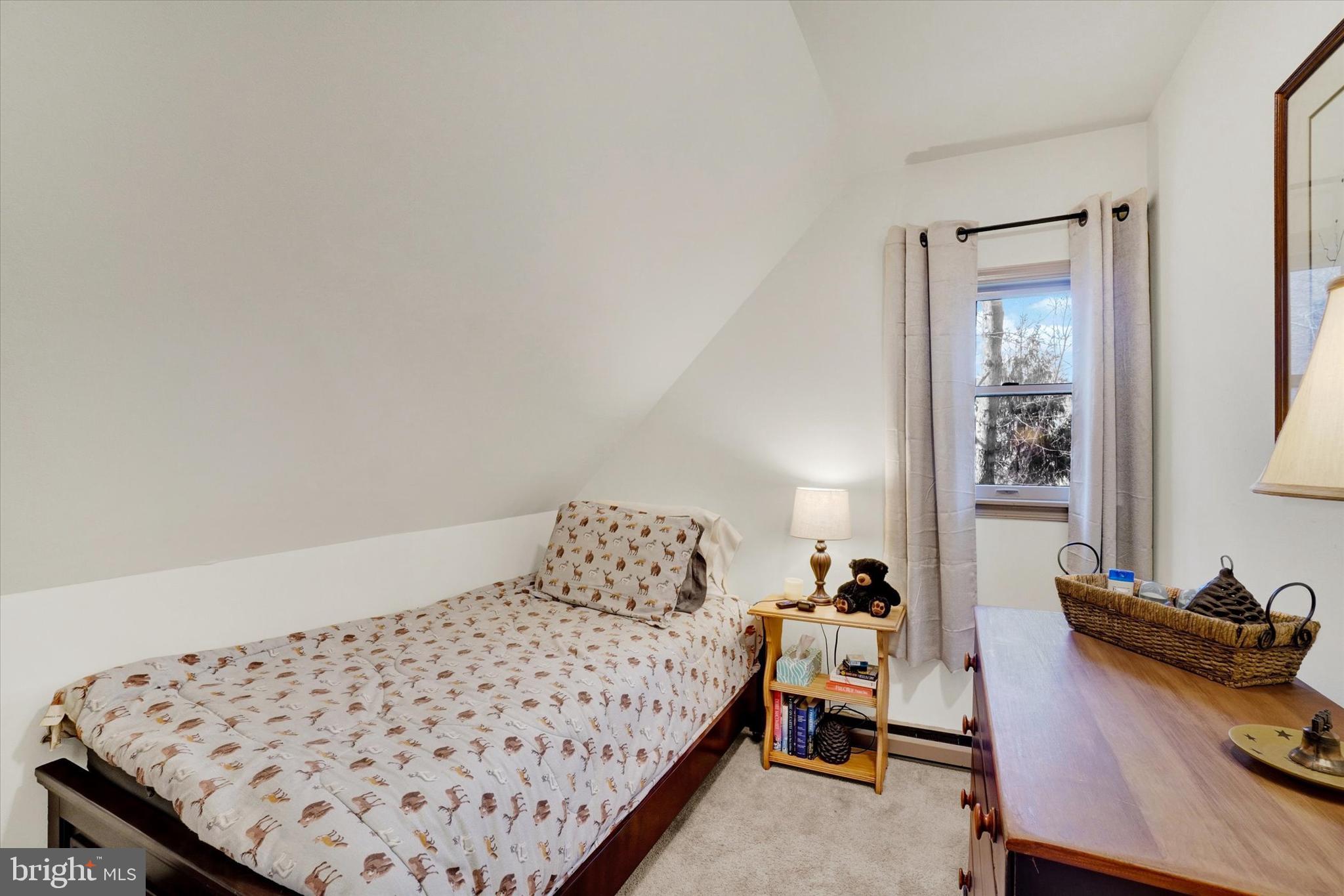 82 Fox Creek Road Wrightsville, PA 17368 - Photo 16 of 32 a bedroom with a bed and wooden floor