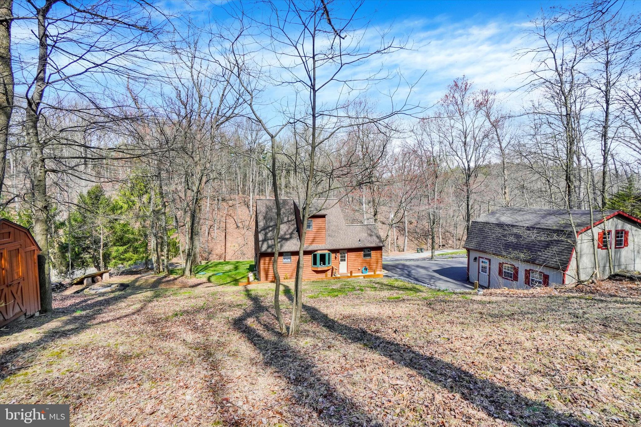 82 Fox Creek Road Wrightsville, PA 17368 - Photo 22 of 32 a backyard of a house with fire pit and outdoor seating