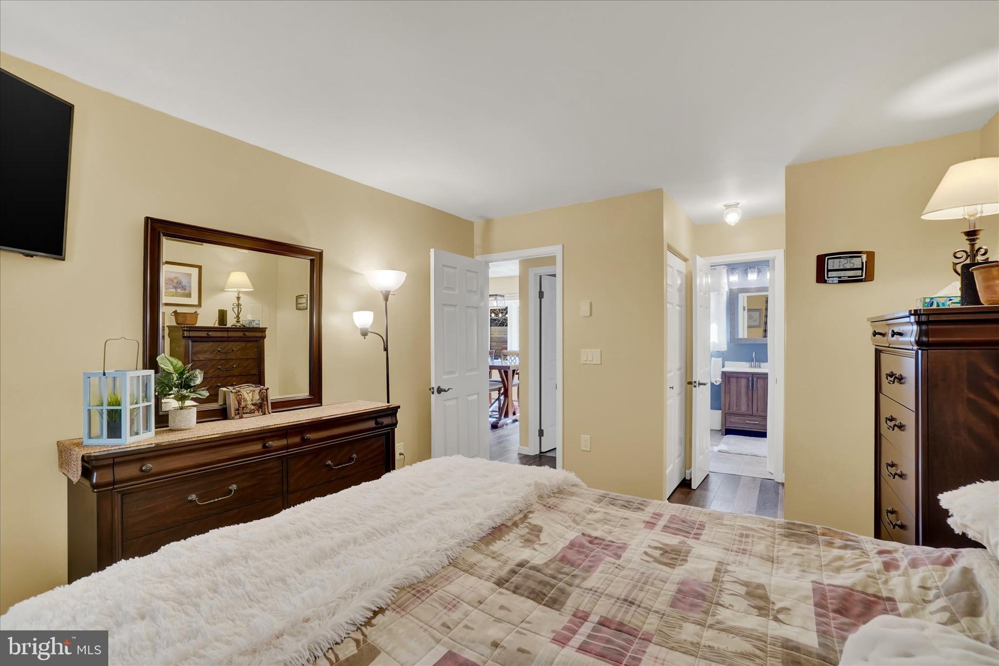 82 Fox Creek Road Wrightsville, PA 17368 - Photo 10 of 32 a bedroom with a bed and a large mirror on dresser