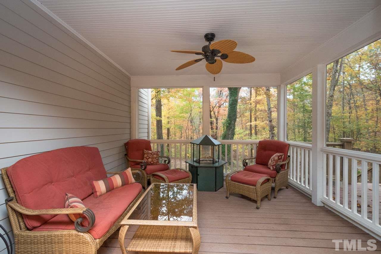 12217 Norwood Road Raleigh, NC 27613 - Photo 5 of 27 a living room with furniture and a large window
