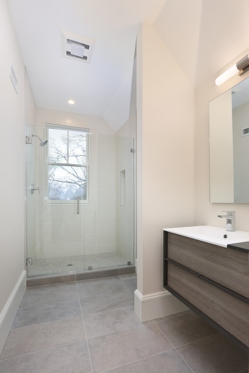 33 Mossfield Road Newton, MA 02468 - Photo 13 of 15 a bathroom with a sink and a mirror