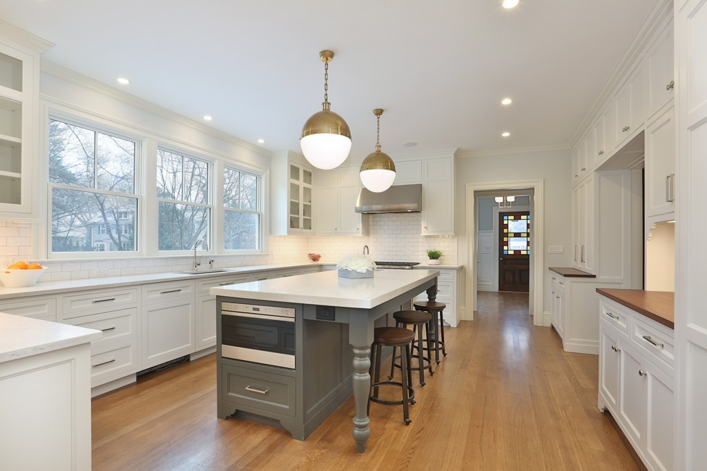 33 Mossfield Road Newton, MA 02468 - Photo 3 of 15 a kitchen with a stove and wooden floor