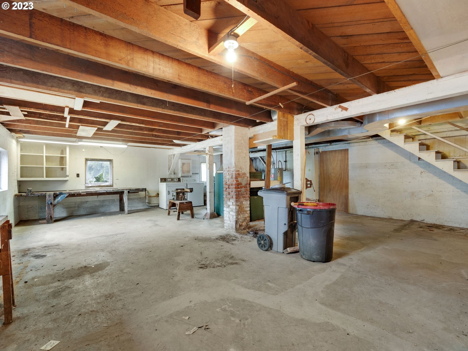 192 West Exchange Street Astoria, OR 97103 - Photo 27 of 34 a view of a patio with table and chairs