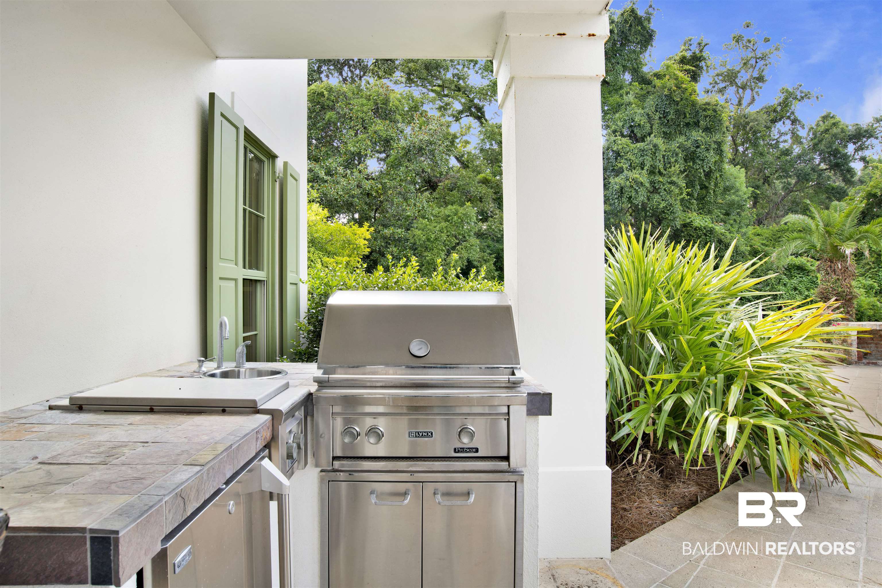 3816 Austill Lane Mobile, AL 36608 - Photo 59 of 80 View of patio / terrace with area for grilling and view of wooded area