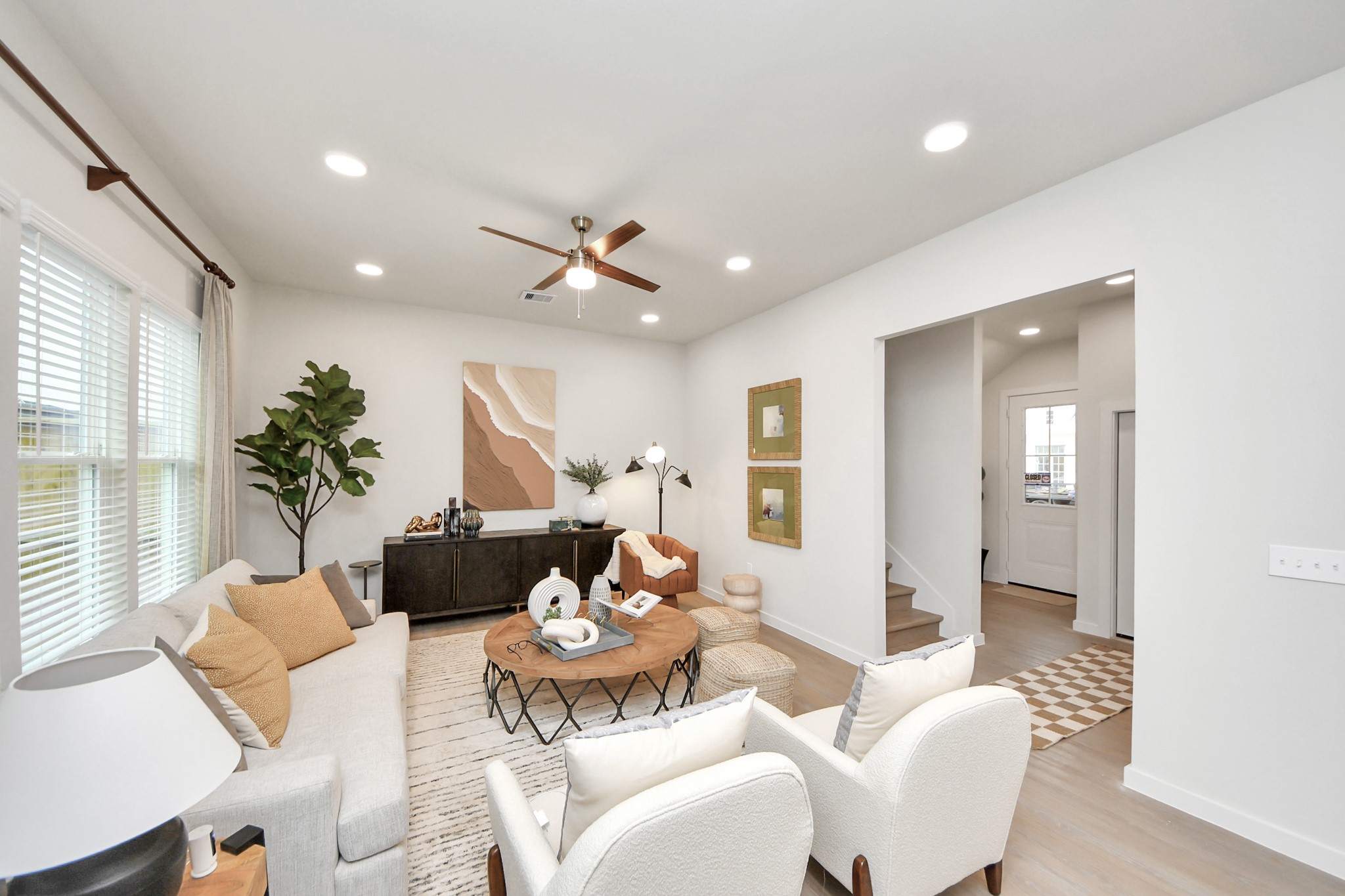 7306 Corey Rushing Lane Richmond, TX 77407 - Photo 12 of 50 a living room with furniture and a large window