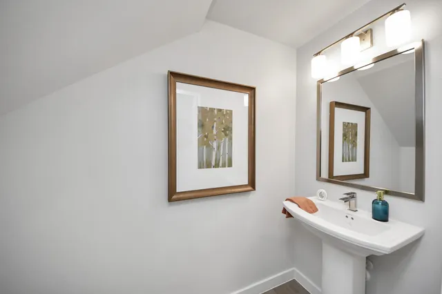 a kitchen with a table and chairs in it