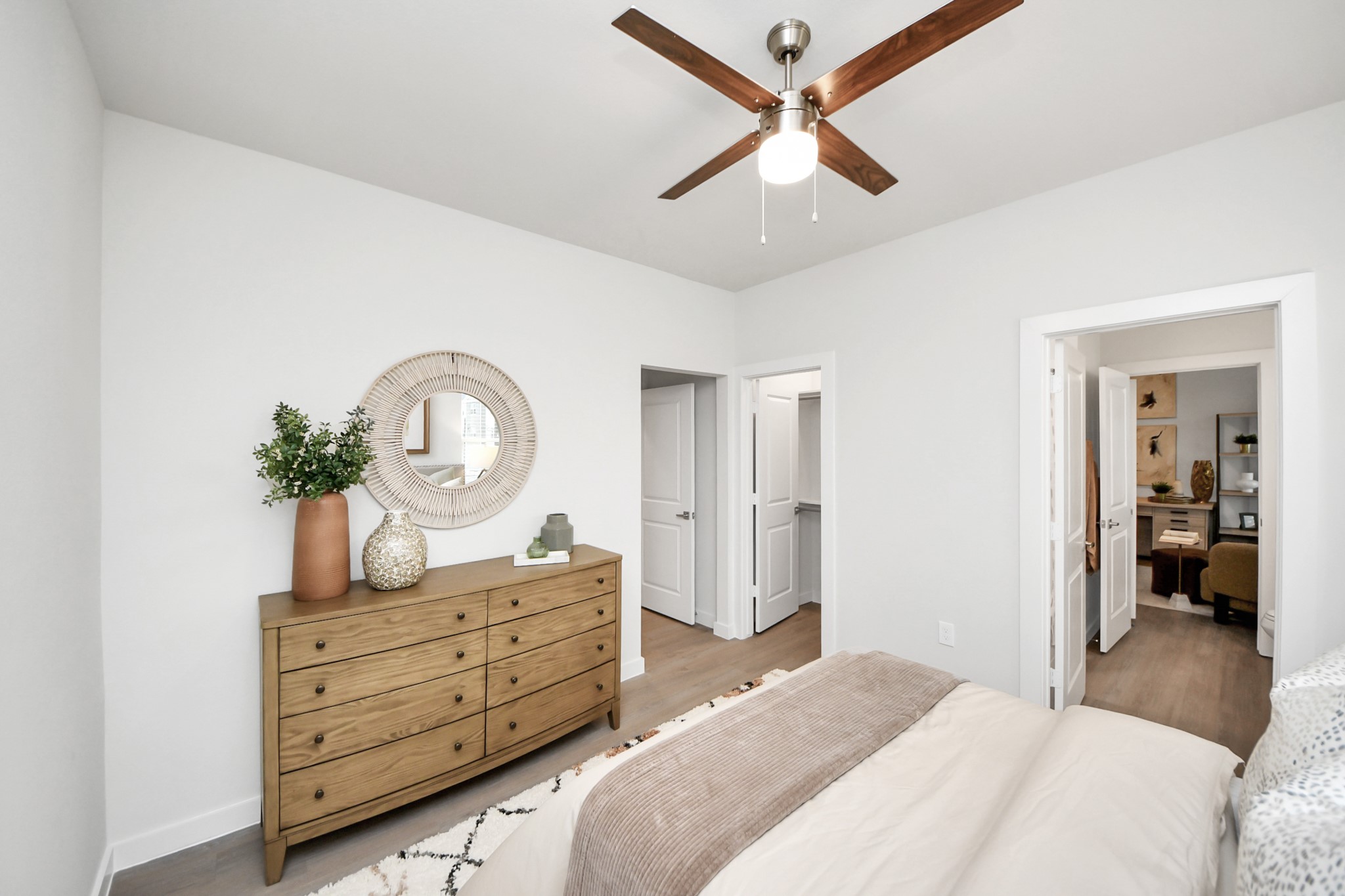 7306 Corey Rushing Lane Richmond, TX 77407 - Photo 16 of 50 a bedroom with a bed and a dresser