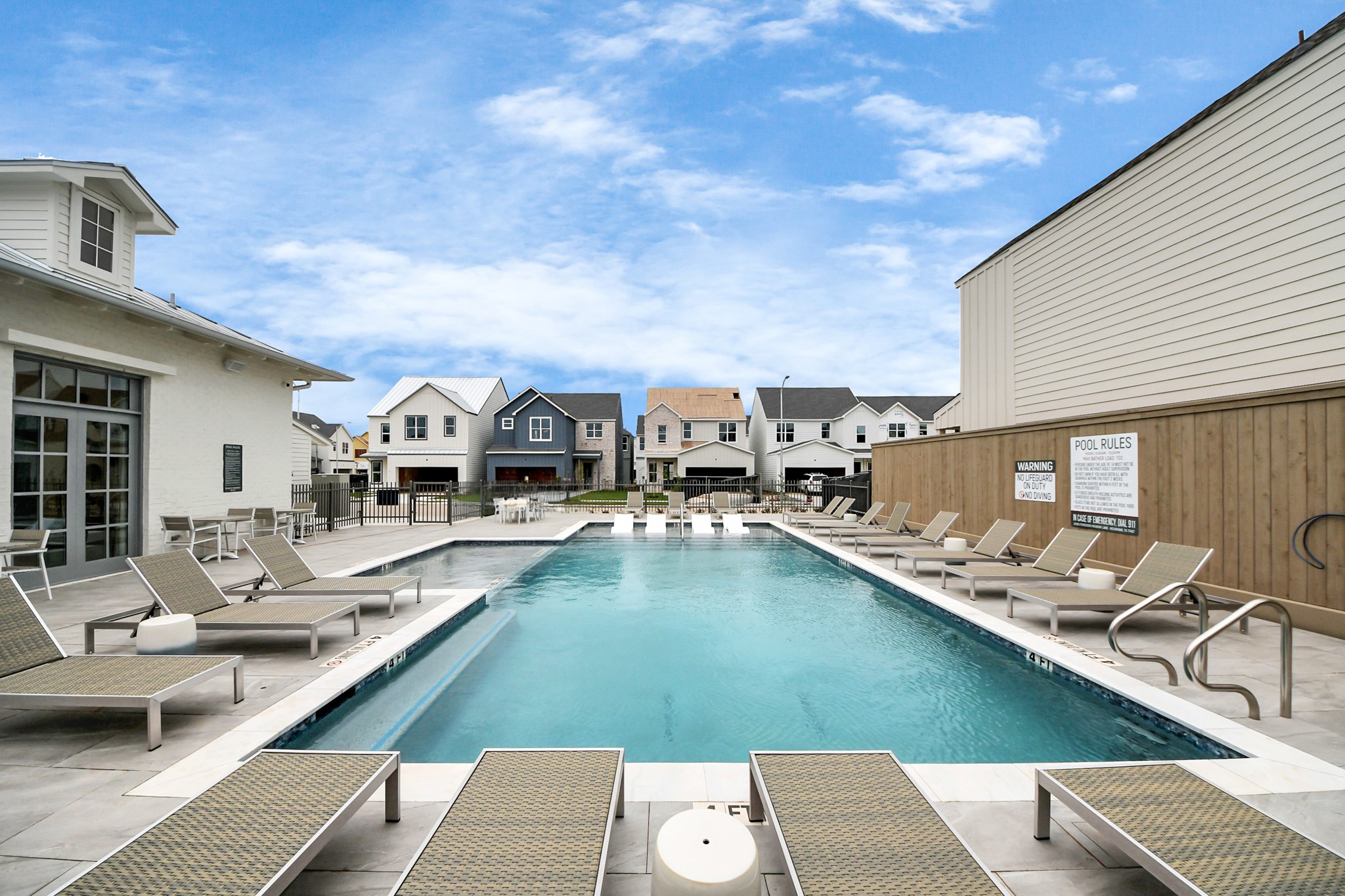 7306 Corey Rushing Lane Richmond, TX 77407 - Photo 34 of 50 a view of a patio with swimming pool table and chairs