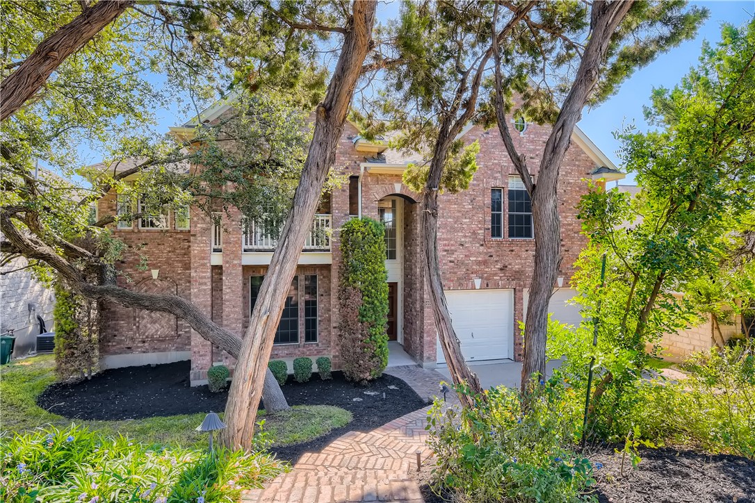 4605 Foster Ranch Road Austin, TX 78735 - Photo 1 of 1 a front view of a house with garden